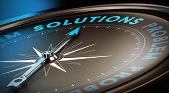 Compass with needle pointing torward word Solutions