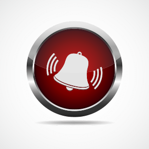White alarm bell ringing on red button with silver colored round frame.